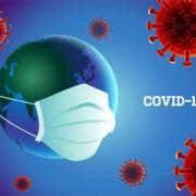 Coronavirus covid 19 prevention with earth wearing mask 768x512